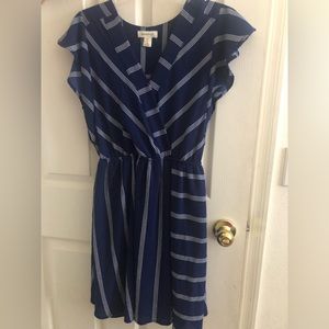 Versatile navy dress with white stripes. Perfect for the summertime!